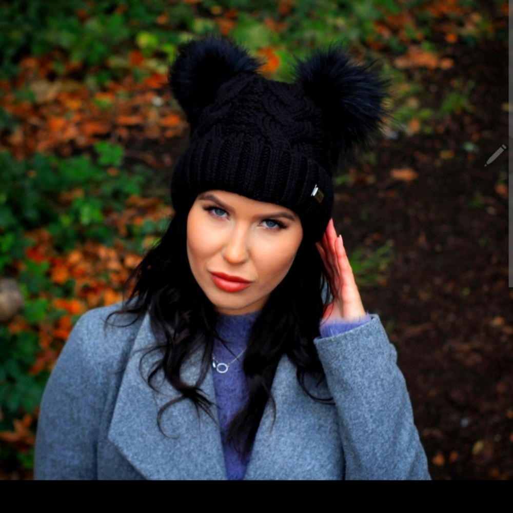 Brand New still in the Package Pom Pom Hat